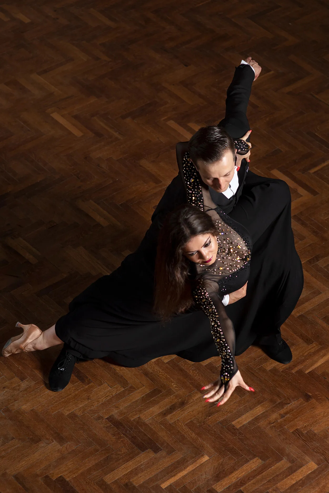 American Smooth dancers in open hold